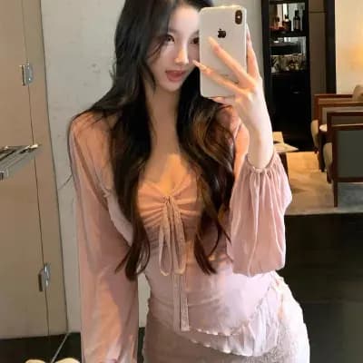 Double-layered mesh long-sleeved top with lace-up pleats